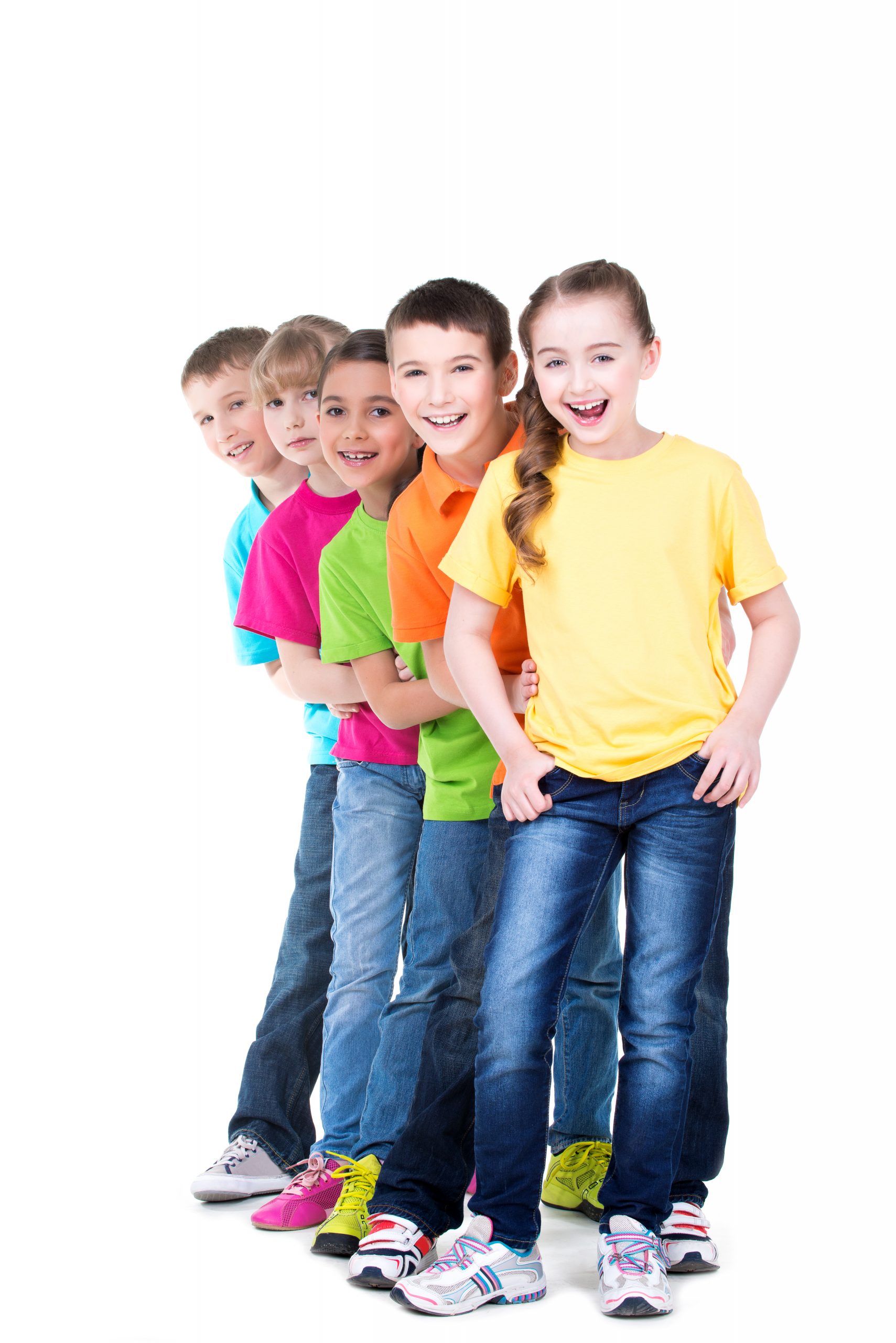 group happy children colorful t shirts stand each other white wall scaled - Quienes somos